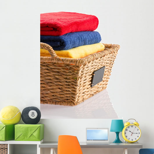 Fresh Clean Towels in a Wicker Basket 