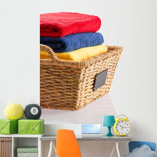 Fresh Clean Towels in a Wicker Basket 
