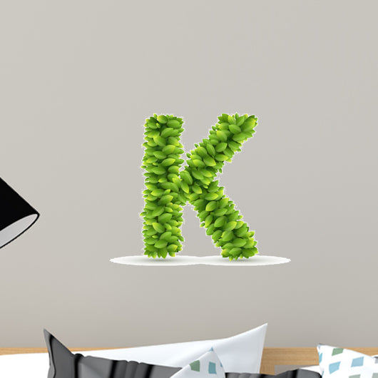 Letter K,  vector alphabet of green leaves 