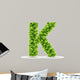 Letter K,  vector alphabet of green leaves 