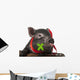 A Cute Little Black Pig Sitting in a Basket Wall Decal