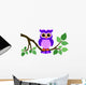 Cute Owl Sitting on a Branch 