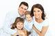 Beautiful happy family - isolated over a white background 