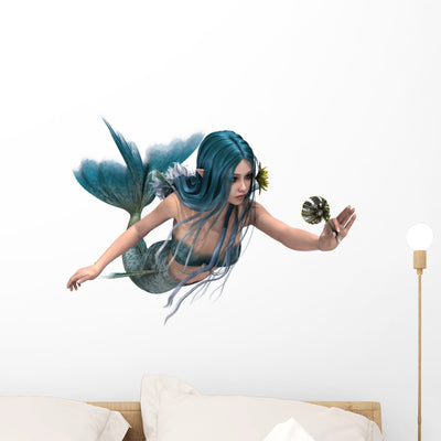 Blue Mermaid Holding Sea Wall Decal shown on a wall