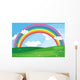 A green landscape with a rainbow in the sky Wall Mural
