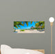 Paradise beach with palms and parasol 