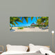 Paradise beach with palms and parasol 