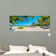 Paradise beach with palms and parasol 