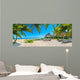 Paradise beach with palms and parasol 
