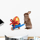 Funny Easter Rabbit with a Blue Wheelbarrow and Golden Egg Wall Decal