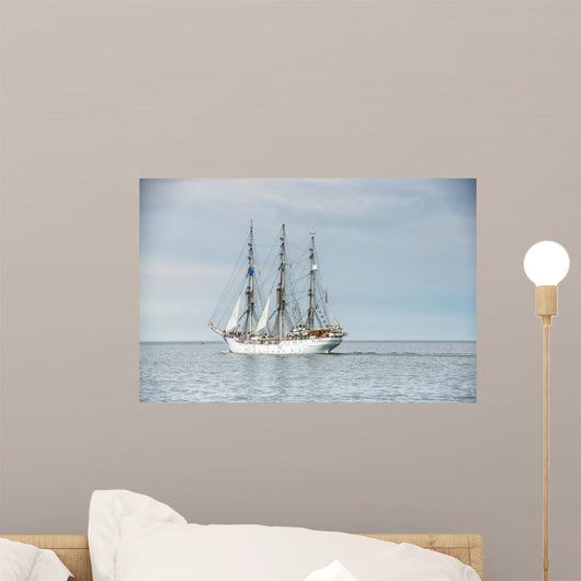 Tall ship on blue water horizontal 
