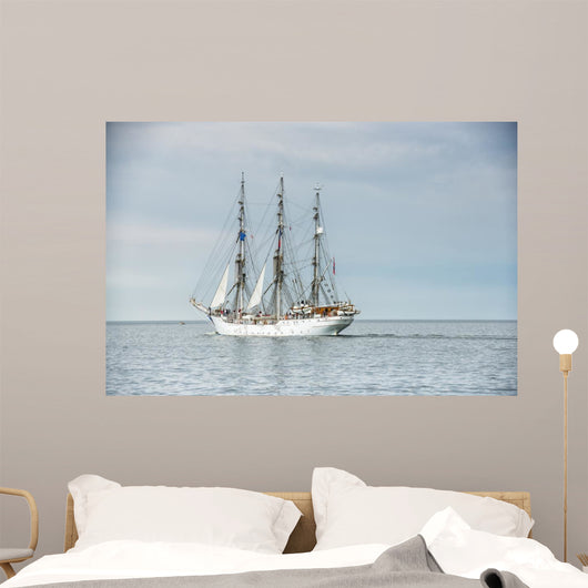 Tall ship on blue water horizontal 