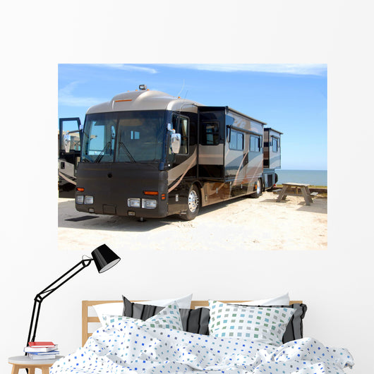 Motorhome camping on beach Wall Mural