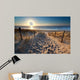 sunshine over path to beach in North sea 