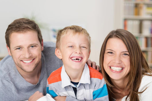sweet little boy with his parents 