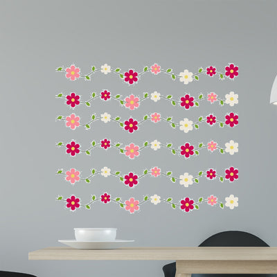 Pink and Red Flowers Wall Decal shown on a wall