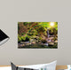 beautiful waterfall comes out of a huge rock in the forest Wall Mural