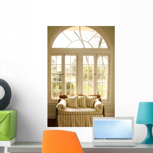 couch in window light Wall Mural