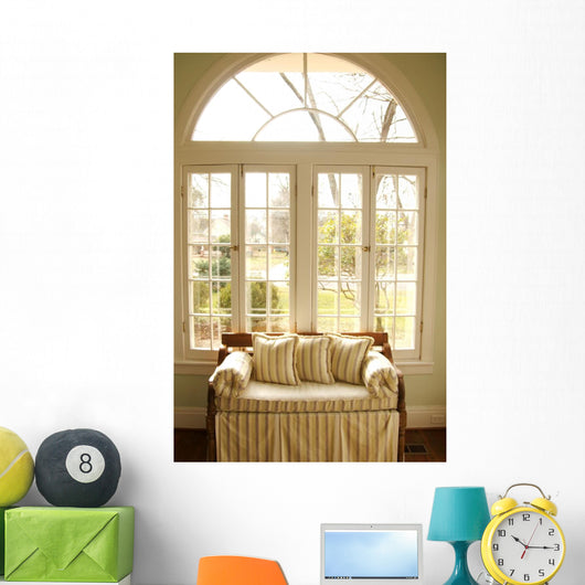 couch in window light Wall Mural