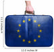 Tourist hand holding vintage leather travel bag with flag of Eur 