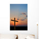 Wooden cross suring a colorful sunset Wall Mural