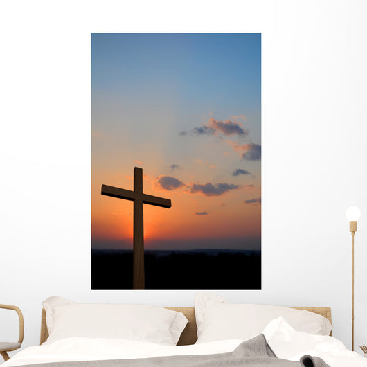 Wooden cross suring a colorful sunset Wall Mural