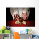 The hands of Jesus offering the Communion wine and bread Wall Mural