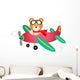 Teddy bear fly on a airplane 