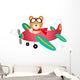 Teddy bear fly on a airplane 