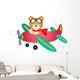 Teddy bear fly on a airplane 