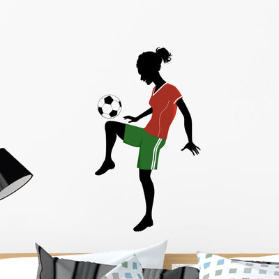 Silhouette Teenage Girl Playing Wall Decal shown on a wall