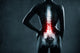 Spine in x-ray. The lumbar spine is highlighted by red colour. 