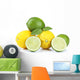Lemons and limes, isolated on white Wall Decal