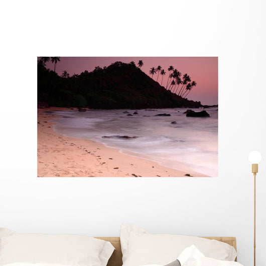 Stunning Cola beach sunset in Goa India. Wall Mural