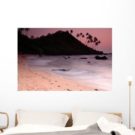 Stunning Cola beach sunset in Goa India. Wall Mural