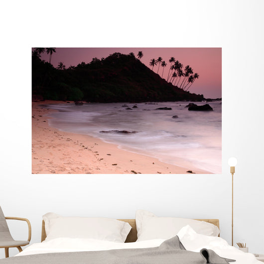 Stunning Cola beach sunset in Goa India. Wall Mural