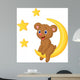 Baby bear sitting on the moon Wall Mural