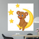 Baby bear sitting on the moon Wall Mural