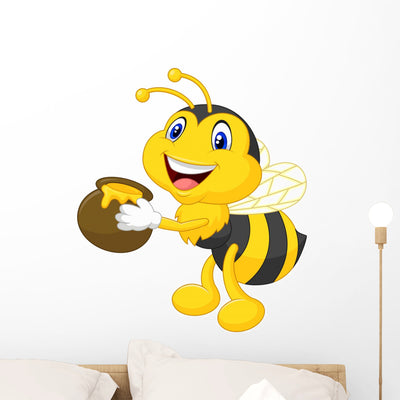 Bee Cartoon Holding Honey Wall Decal shown on a wall