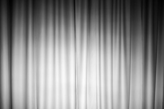 White curtain photo background with spotlight on it Wall Mural