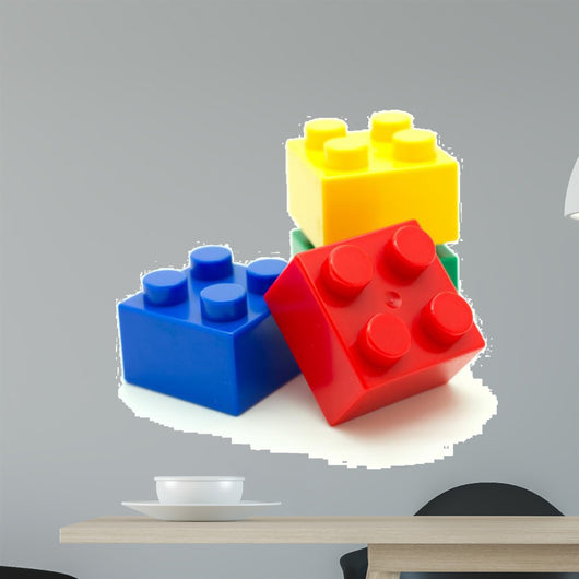 Plastic building blocks on white background 