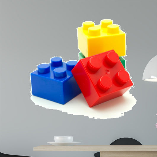 Plastic building blocks on white background 