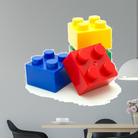 Plastic building blocks on white background 