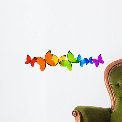 Rainbow Butterflies Border for Wall Decal shown on a wall
