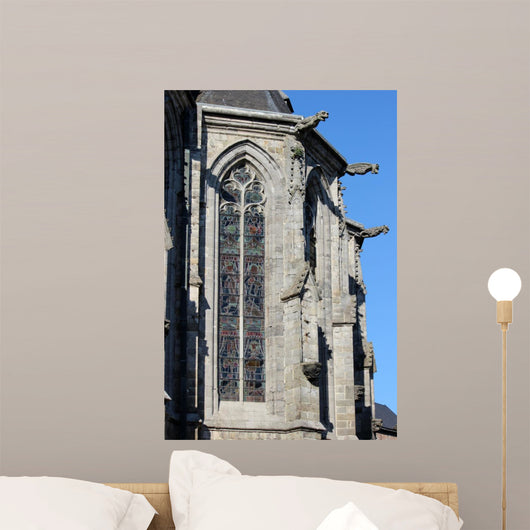 Gargoyles and stained-glass windows of the Cathedral of St. Waudru Mons 