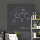 Caffeine molecule and cup of coffee chalked on blackboard 