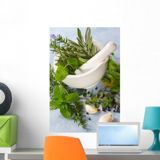 Mortar and pestle with fresh herbs, garlic and peppercorns. Wall Mural