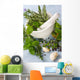 Mortar and pestle with fresh herbs, garlic and peppercorns. Wall Mural