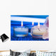 Candles with flower on blue background 