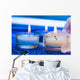 Candles with flower on blue background 